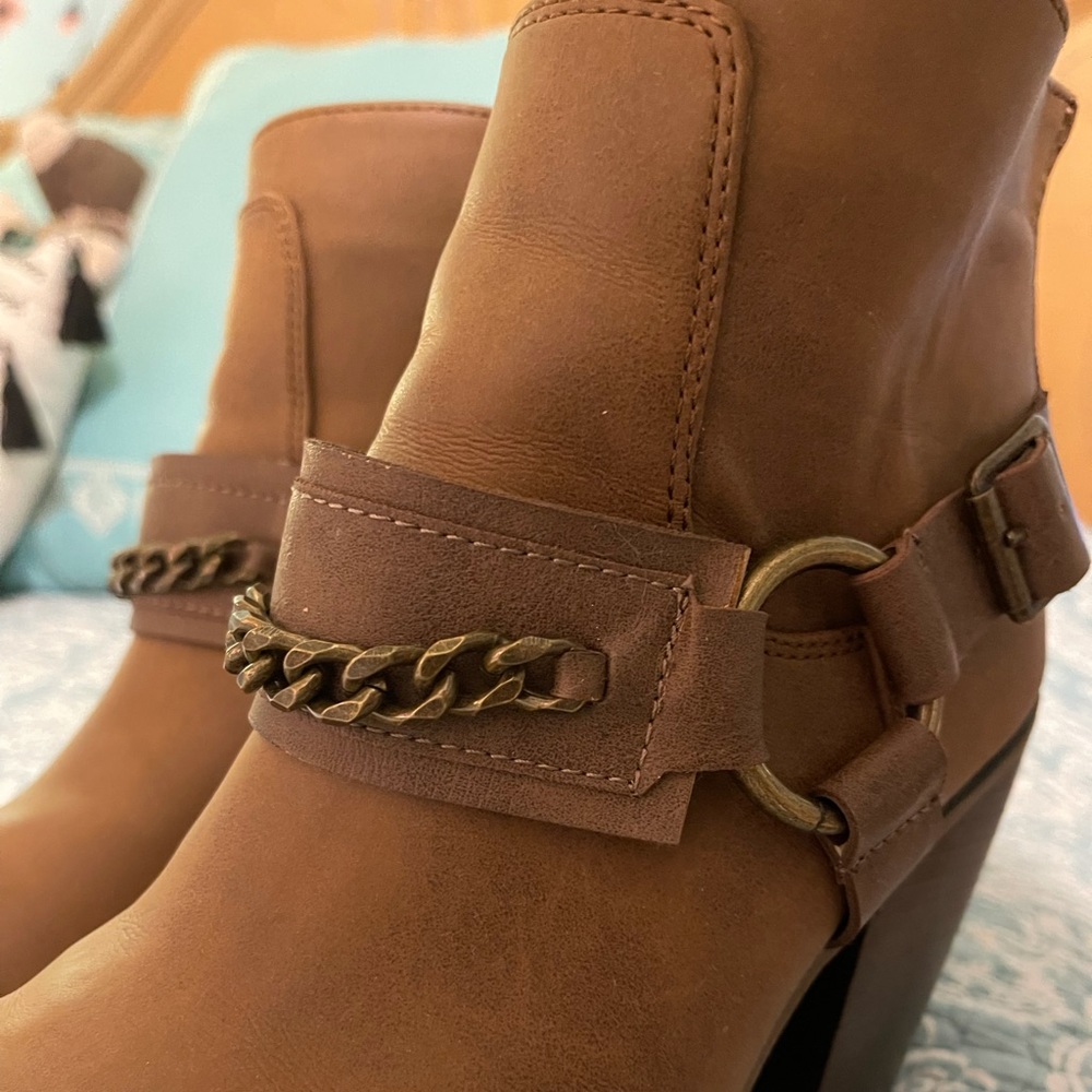 Brown booties with gold detailing!
